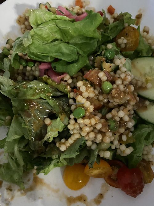 Tomato cous cous salad. Amazing flavor!   at Bare Bones in La Porte