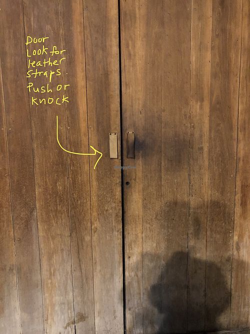 Push or knock Hotel door to enter at Hotel Sin Nombre in Oaxaca