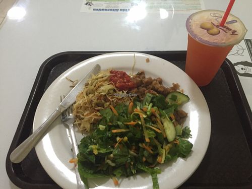 salad, noodles, sweet and sour, juice  at Loving Hut in Panama City