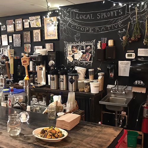 behind the counter  at Local Sprouts Cafe in Portland