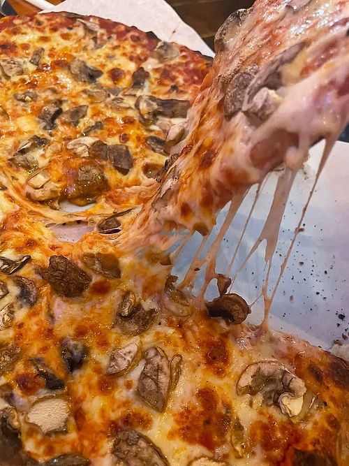 Stretchy gooey vegan cheese at Thirsty Moose Taphouse in Exeter