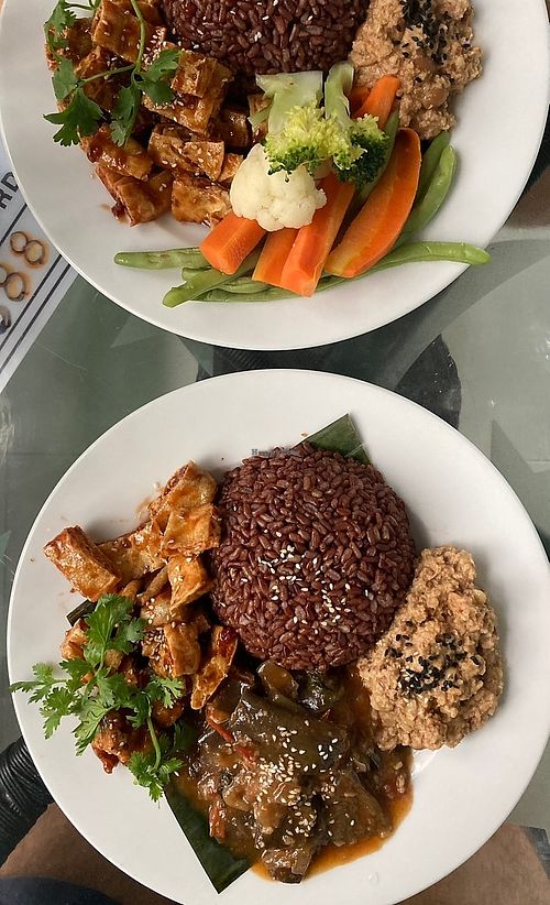 Beautiful meal! Peanut stew, eggplant stew, red rice and tofu cubes in soy and lime  at Peanuts in Hoi An