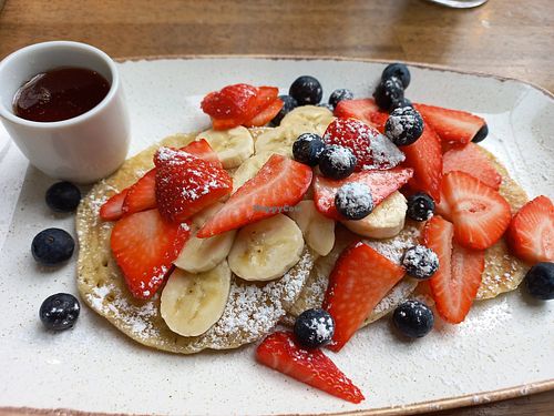 Pancakes with fruit and maple syrup (vegan on request) at Walnuts in Orpington