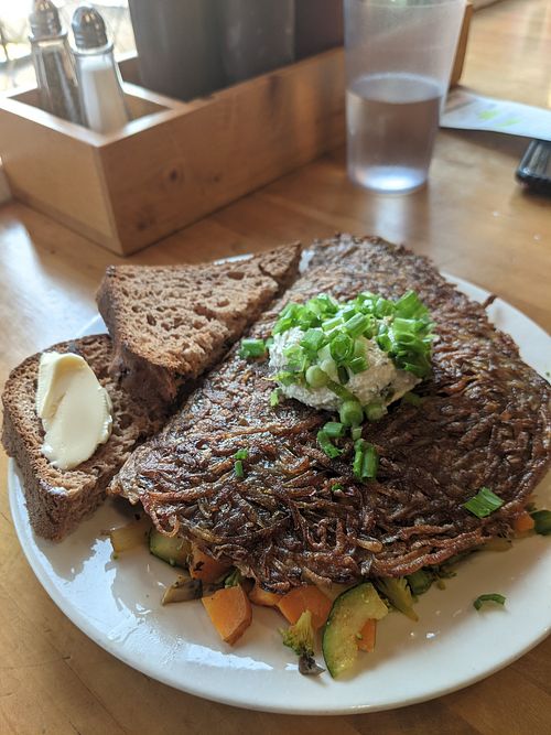 Little Bear Omelette. Not too crazy about the potato shell - it was tough to cut through but you can just sub for country potatoes. at Morning Glory Cafe in Eugene