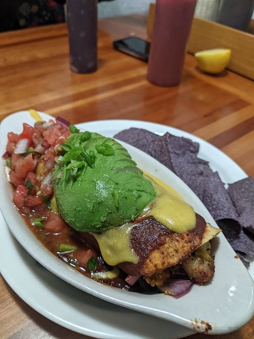 Breakfast Enchiladas - from the Fall Specials menu. SO delicious 🤤 at Morning Glory Cafe in Eugene