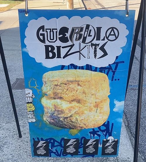 Look for the sign on the sidewalk. The shop is set back in a lil alley    at Guerilla Bizkits in Nashville