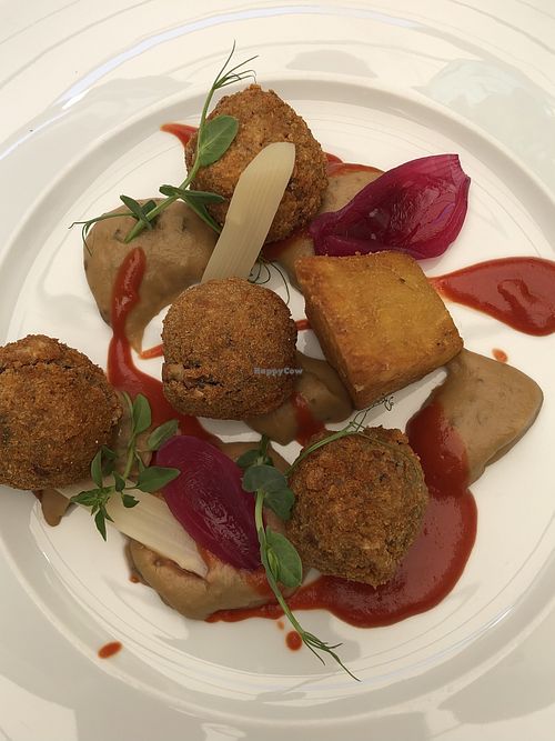 Bean and grain fritters, roasted aubergine crema and potato croquette  at Hostaria Alla Tavernetta in Udine