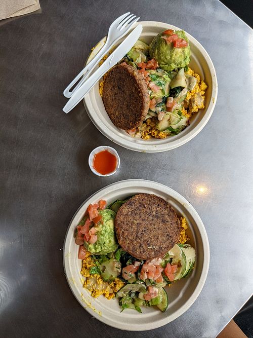Green machine bowls (quinoa, tofu scramble, veggies, green goddess sauce, taro patty, avocado mash) - DELICIOUS!! at The Spot in Princeville