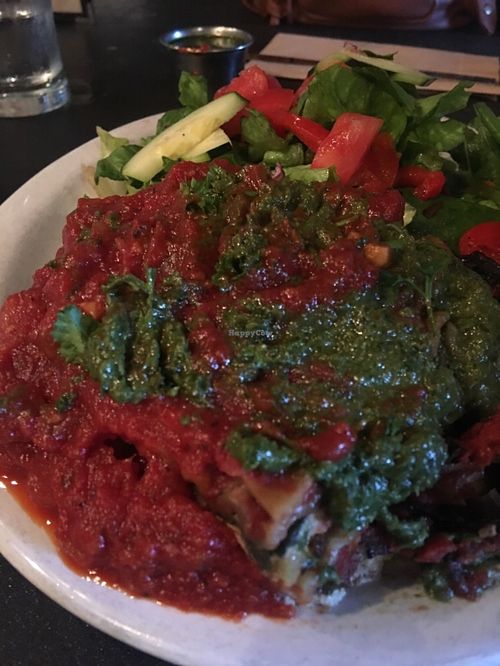 Vegan lasagna with pesto and marinara, salad at Cafe Gertrude in Portland