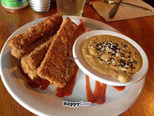 Spicy Tempeh Sticks with Thai peanut dipping sauce at Cafe Gertrude in Portland