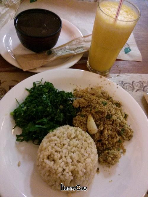 Feijoada set menu with wheatgerm, kale and brown rice. Passionfruit juice with mint. at Bio Carioca in Rio De Janeiro