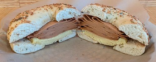 roasted garlic bagel with vegan egg and ham at Seize the Bagel - Orchards in Vancouver