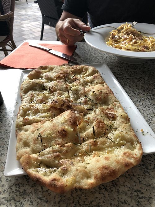 Pinsa with rosemary and garlic  at Osteria La Vigna in Isny Im Allgaeu