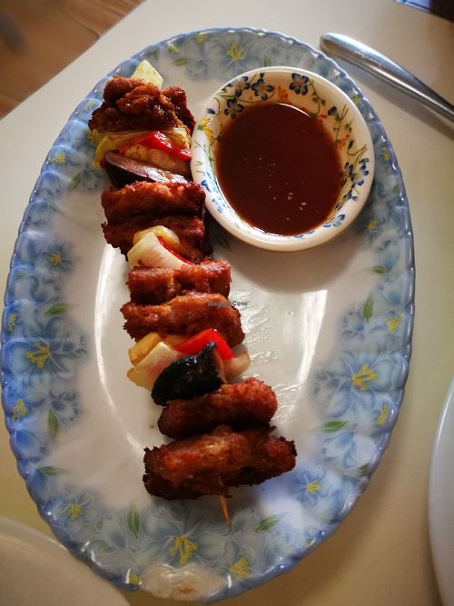 A mock-meat and veggies skewer + dipping sauce at Loving Hut - Nowolipie in Warsaw