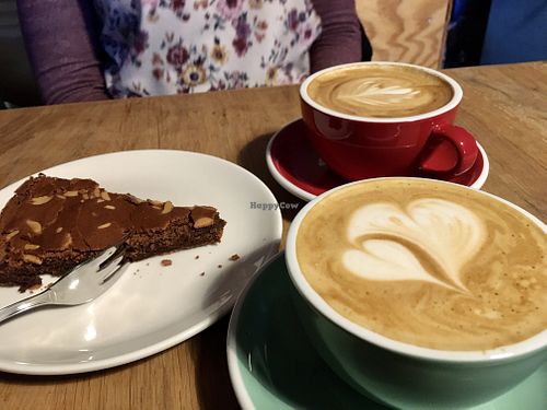 Cappuccino with vegan cake  at 92 Grad in Rostock