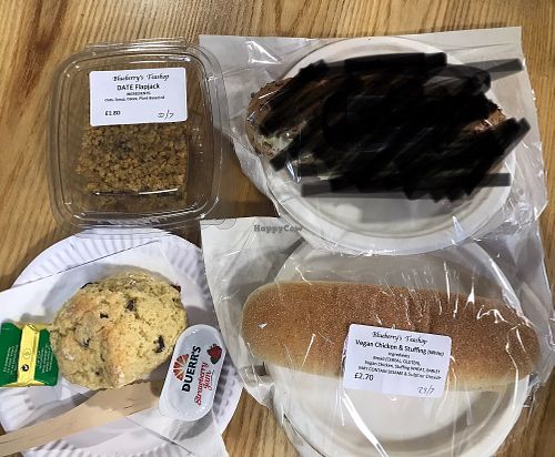 Vegan turkey and stuffing roll, fruit scone, and flapjack.  at Blueberry's Tea Shop in Alston