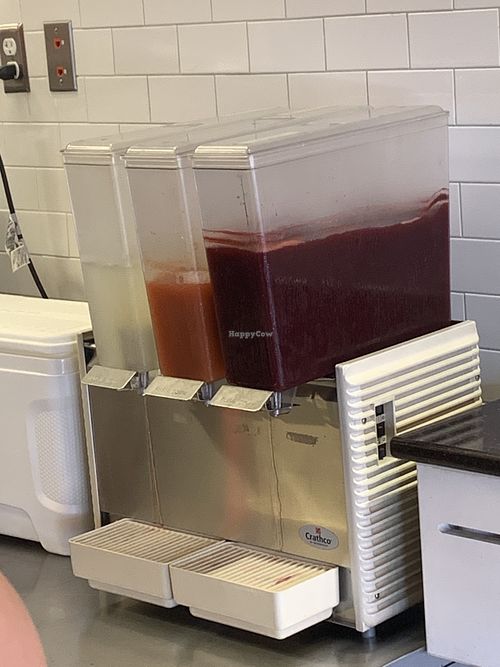 Fresh made classic, strawberry mint, and blueberry limeade dispenser  at SubVegan Sandwiches in Santa Ana