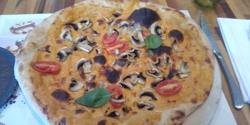 Vegan pizza with cashew cheese. at Perbacco in Locarno