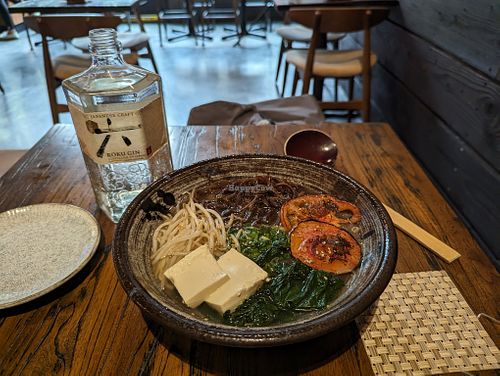 Ramen with spinach and tomato at Haruki Ramen & Izakaya in Norwalk