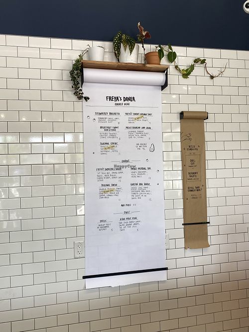 Menu with many items marked off at Freya's Diner in St Petersburg