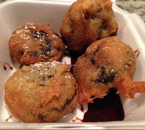Deep Fried Oreos in chocolate sauce, & sprinkled with powdered sugar  at Doomie's Home Cookin' in Hollywood