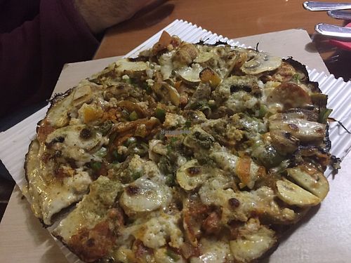 Pizza loaded with veggie meat at Zamin in Tehran