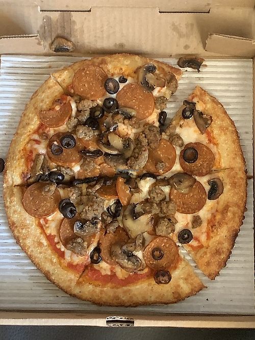Build Your Own Vegan Pizza with vegan cheese, vegan sausage, and vegan pepperoni at University Pizza Company in Riverside