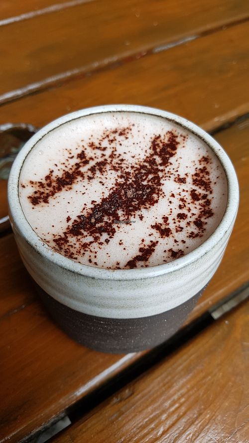 Hot chocolate with oat milk at Eartha in Cardiff