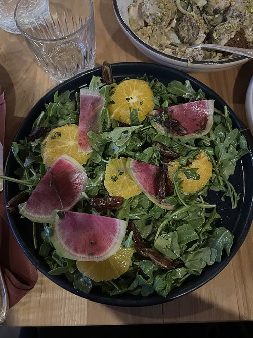 daye and tangerine arugula salad w a sweet cinnomin marinade   at Baba in Spokane