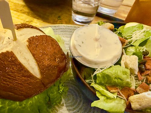 Nashville, hot chicken burger with vegan Caesar salad  at Vegan Street in Calgary