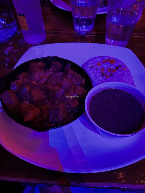 Bad lighting but tofu and veggies. I suggest this!   at 90 Miles Cuban Cafe in Chicago