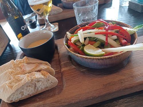 Vegan curry with rice and bread at Beachclub Lekker in Vrouwenpolder