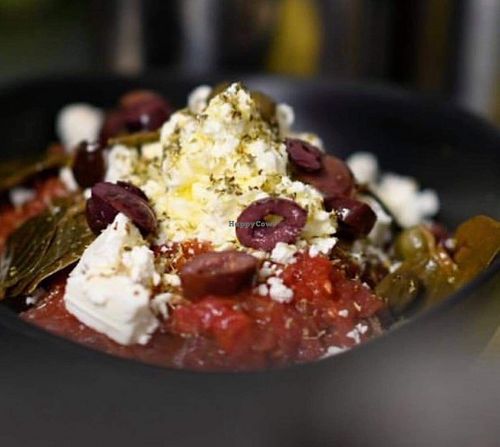 Cretan Dakos with rusk, fresh tomatoes, caper leaves, olives, Greek virgin olive oil! With vegan (vegan crumble) or vegetarian (feta) cheese option! at W Karytsi in Athens