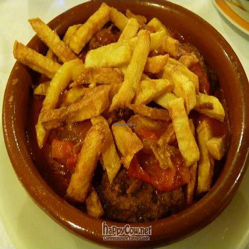 Soy balls with tomato-pepper-onion sauce and fries at Bodega La Petra in Arnedillo