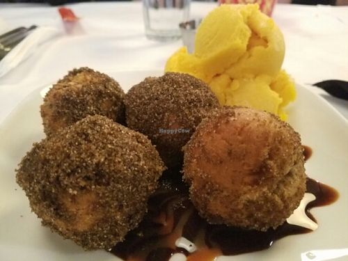 Cinnamon donuts with chocolate sauce and mango sorbet at Wok in the Park in St Louis Park