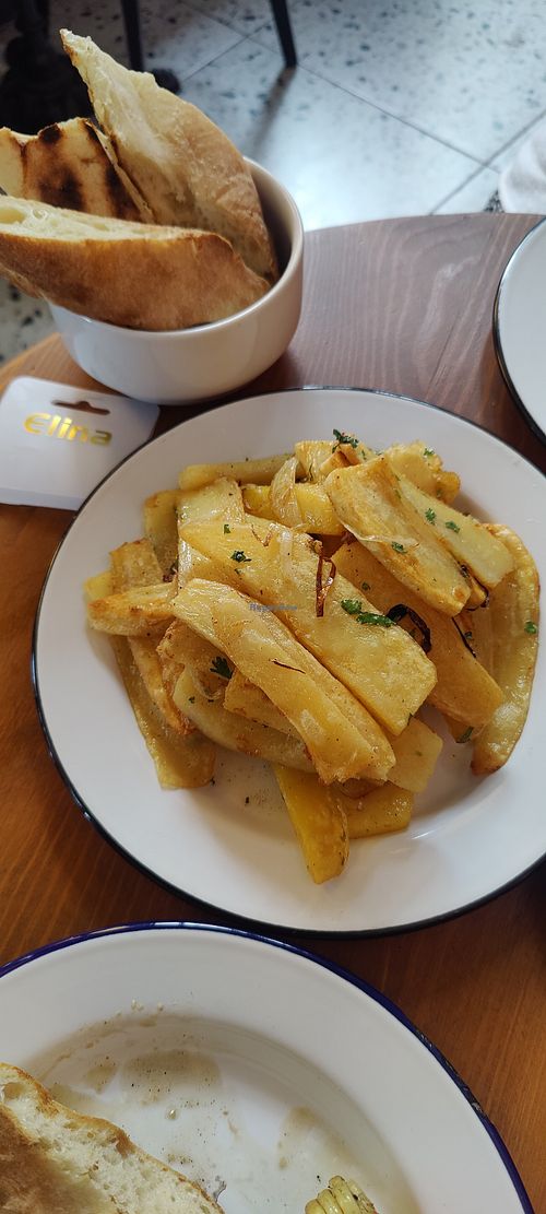 Fried potatoes and onions. at Honoré in Tbilisi