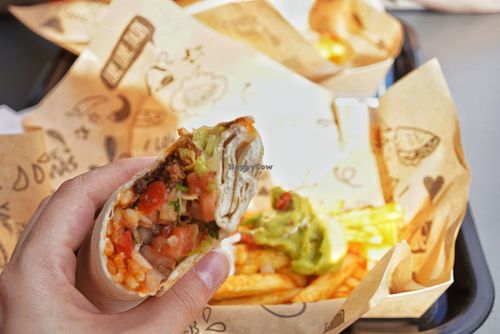 Burrito menu with fries and extra guacamole at Taco Bell in Oulu