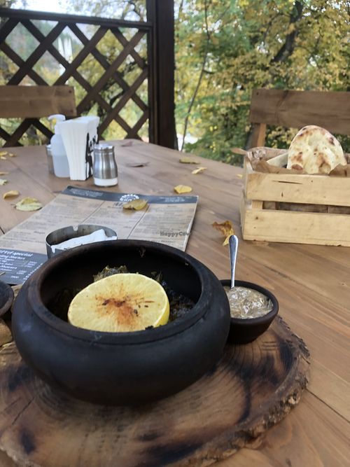 Vegan tolma and bread  at Kchuch Restaurant in Dilijan