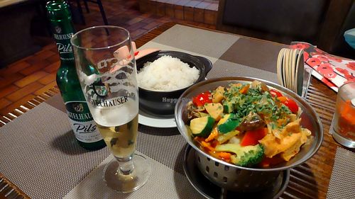 Delicious main dish, vegetables, fried tofu and rice. Savory beer "Distelhäuser Pils". at China Thai Restaurant Mekong in Wertheim