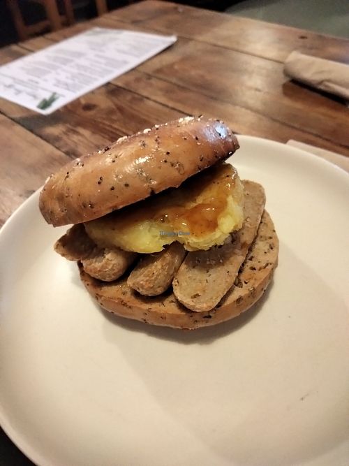 Vegan sausage & hash brown bagel. at Happy Bean in Southampton