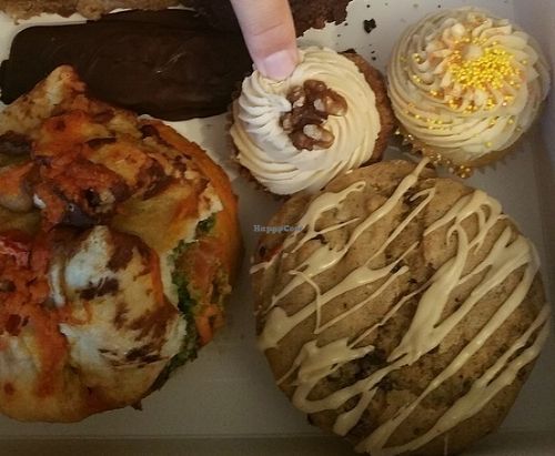 Chocolate cupcake, Carrot cupcake, Lemon Cupcake, Espresso chip muffin, Vegan butterfinger, Pesto Pretzel bagel at Mud Pie Vegan Bakery and Coffee in Kansas City