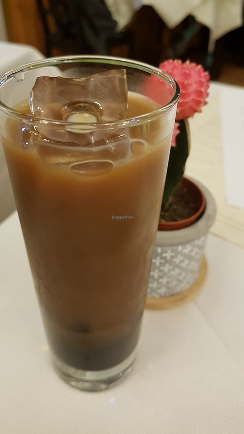 Thai iced milk coffee with oat milk at Mali Vegan Thai in South West London