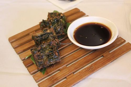 Crispy Chinese chive cake served with sweet chilli soy sauce dip.  at Mali Vegan Thai in South West London