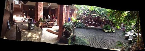 Soma courtyard dining area and stage at Soma Cafe in Ubud