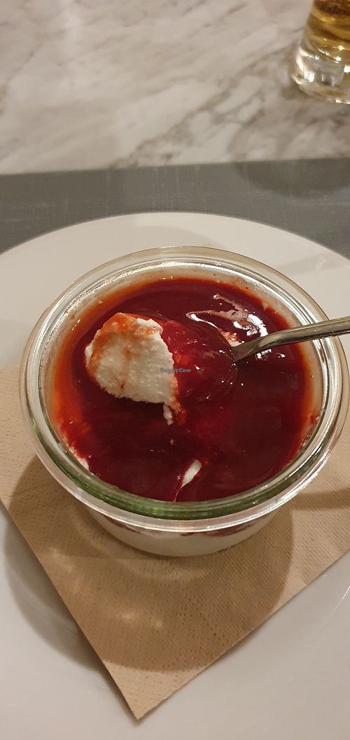 Coconut cream and raspberry desert. at Touli in Imperia