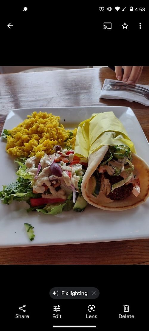Falafel, comes with rice and salad. Garlic dressing was delicious! at Sluggo Brewing Tap & Kitchen in Tacoma