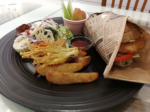 Veggie burger with salad, wedges and tempura. at Shū Shānghào - 蔬商號 in Hualien