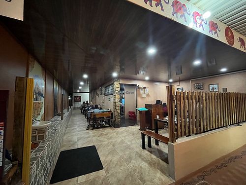 Restaurant interior at Sunny's Indian Restaurant in La Fortuna