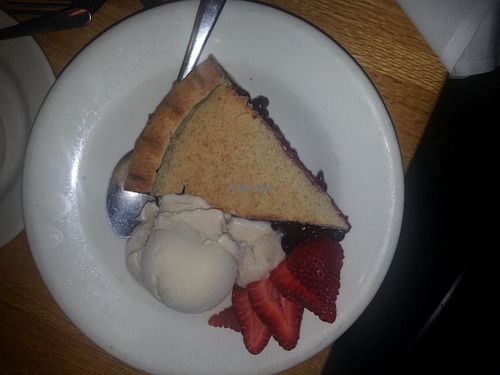 Blueberry Pie, vegan ice cream and organic strawberry garnish.  DELICIOUS.
 at Mother's Cafe and Garden in Austin