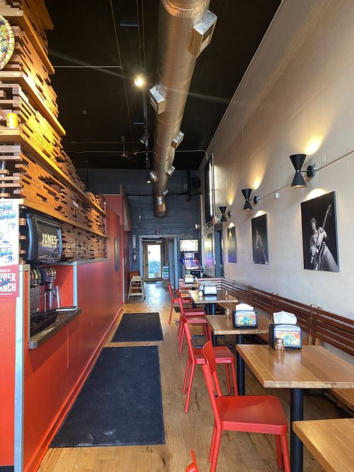 Drink Station, Arcade, and Seating Area (Ample)  at Sizzle Pie - E Burnside in Portland